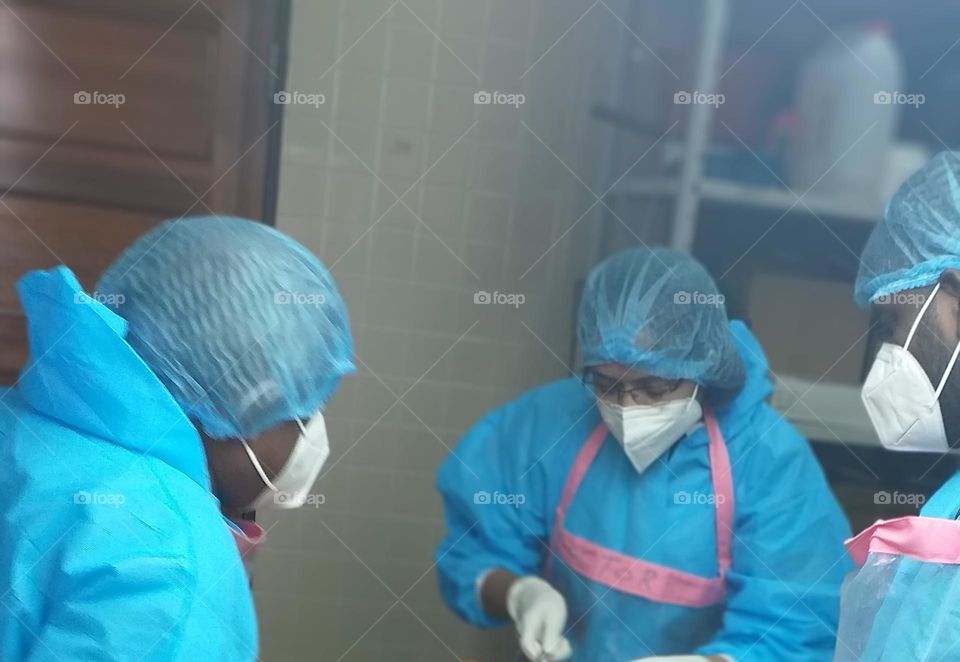 Doctors in autopsy room