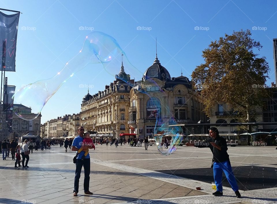 huge bubble in Montpellier. Background is Place de la Comedie in Montpellier, France.