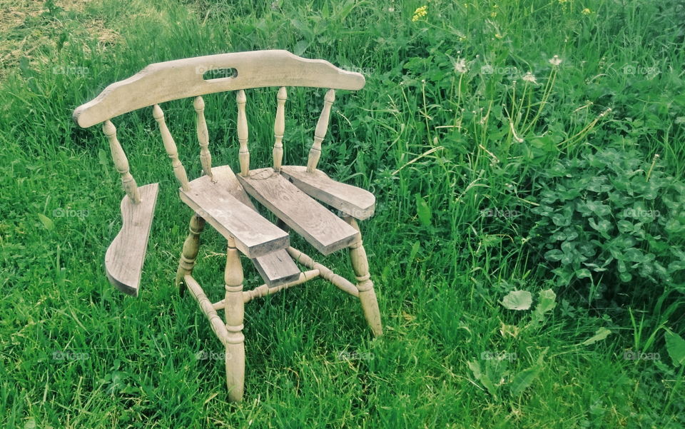 Broken chair. Old wooden chair is broken