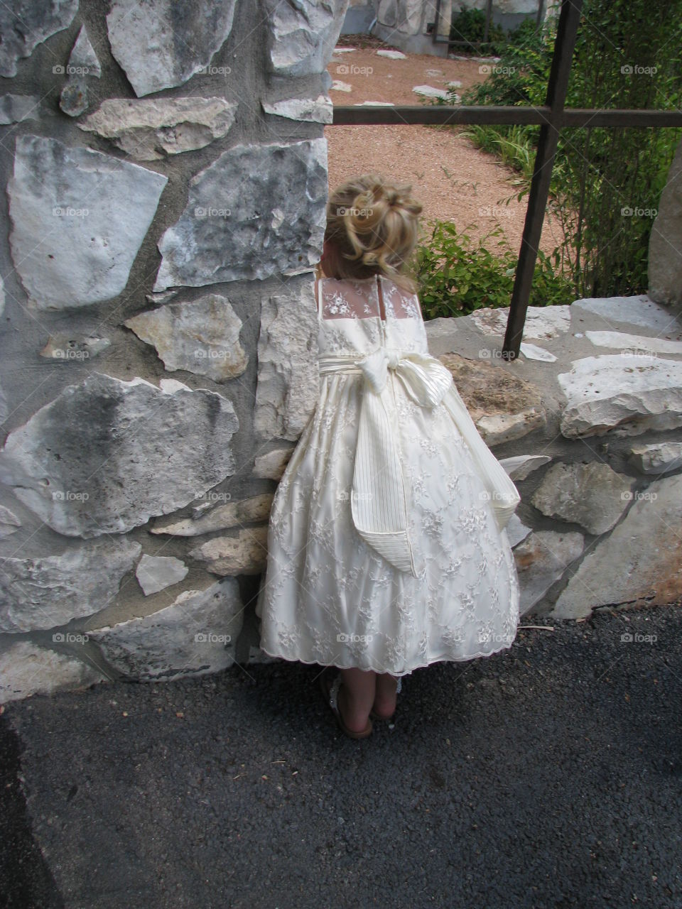 Waiting is hard. Girl at a wedding