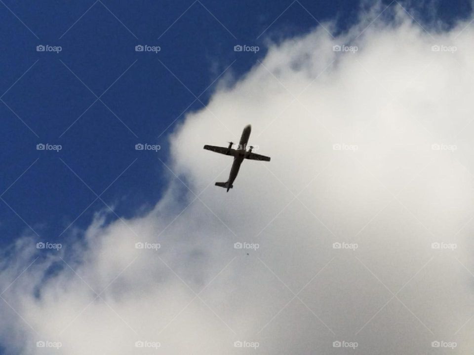 Beautiful airplane flying cross the sky.