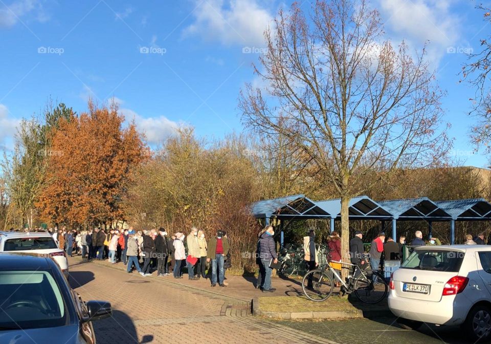 crowd attending  cemetery on All Saints Day