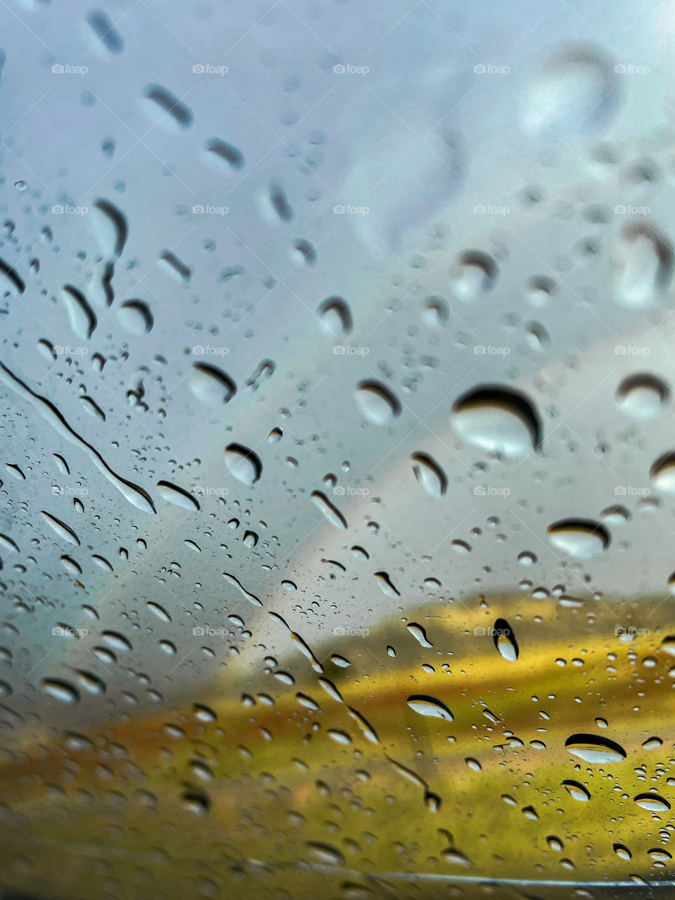 Devils tower rain storm rainfall mirror reflection mountains scenic outdoors nature stormy drops waterdrops raindrops droplets drops views water splash splashes bubbles spots rainy cloudy glass Adventure exploring landscape