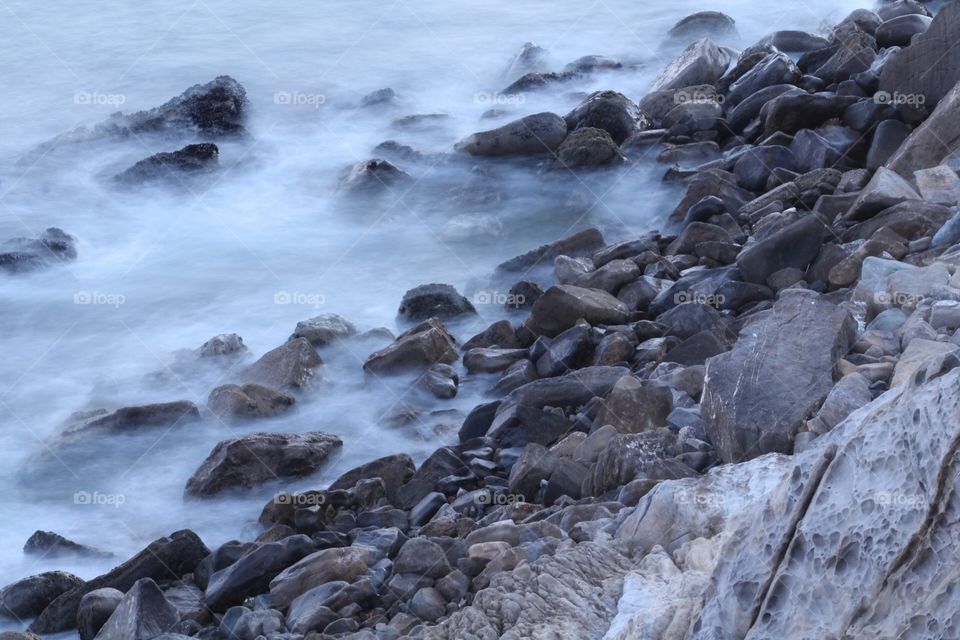 Long exposure of gorgeous beach shore in SoCal 