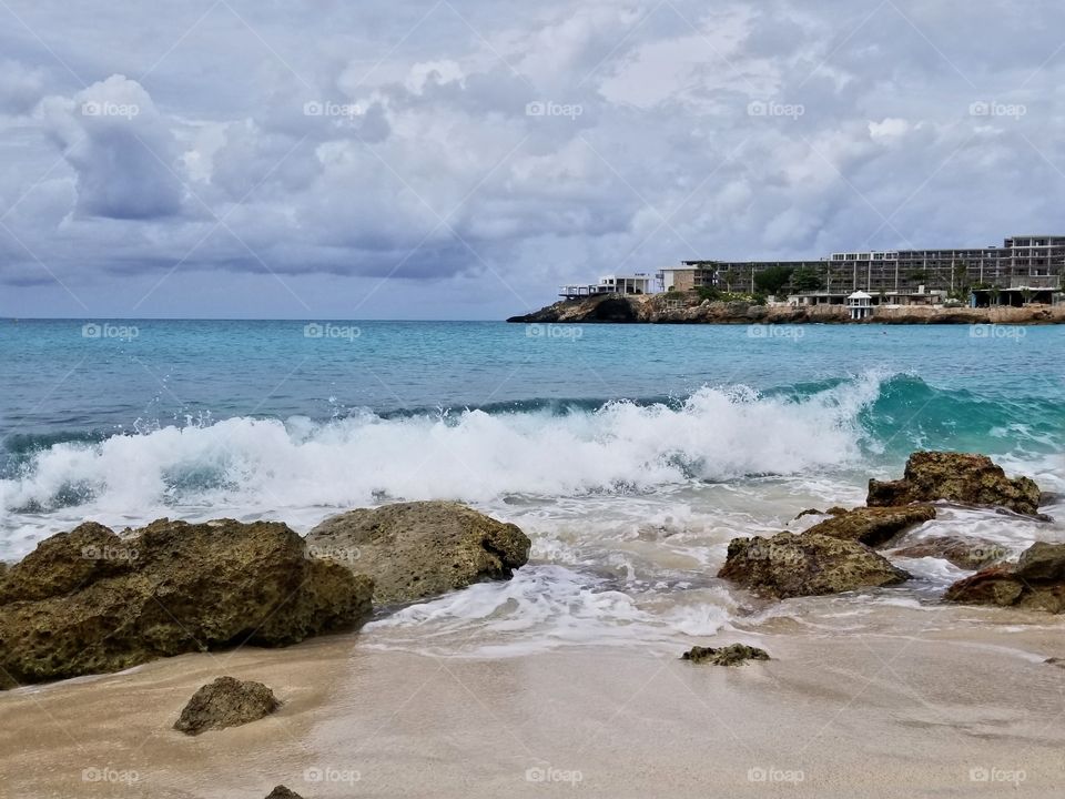 Waves crashing on Mano beach St Maarten