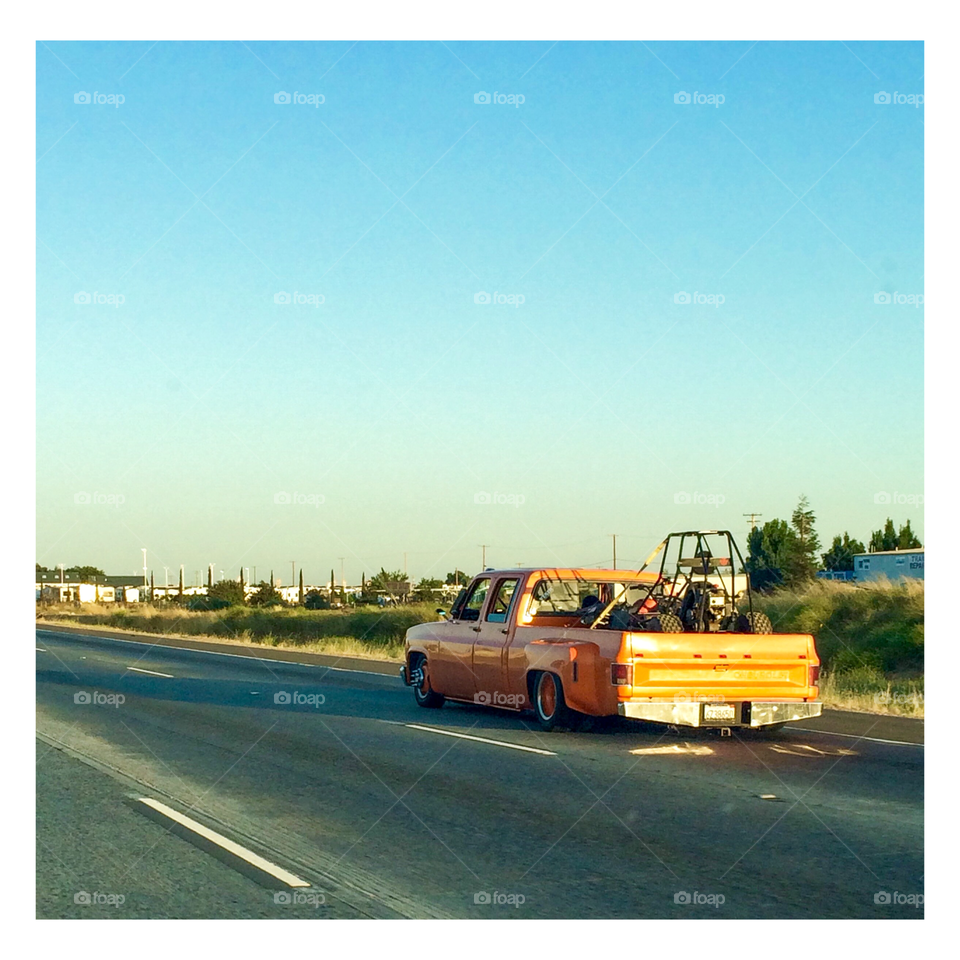 Slammed Orange Chevy. Snapped a shot of this slammed orange Chevy truck on the way to Yosemite.