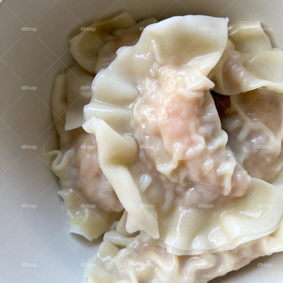 Boiled dumpling in asian flavour 