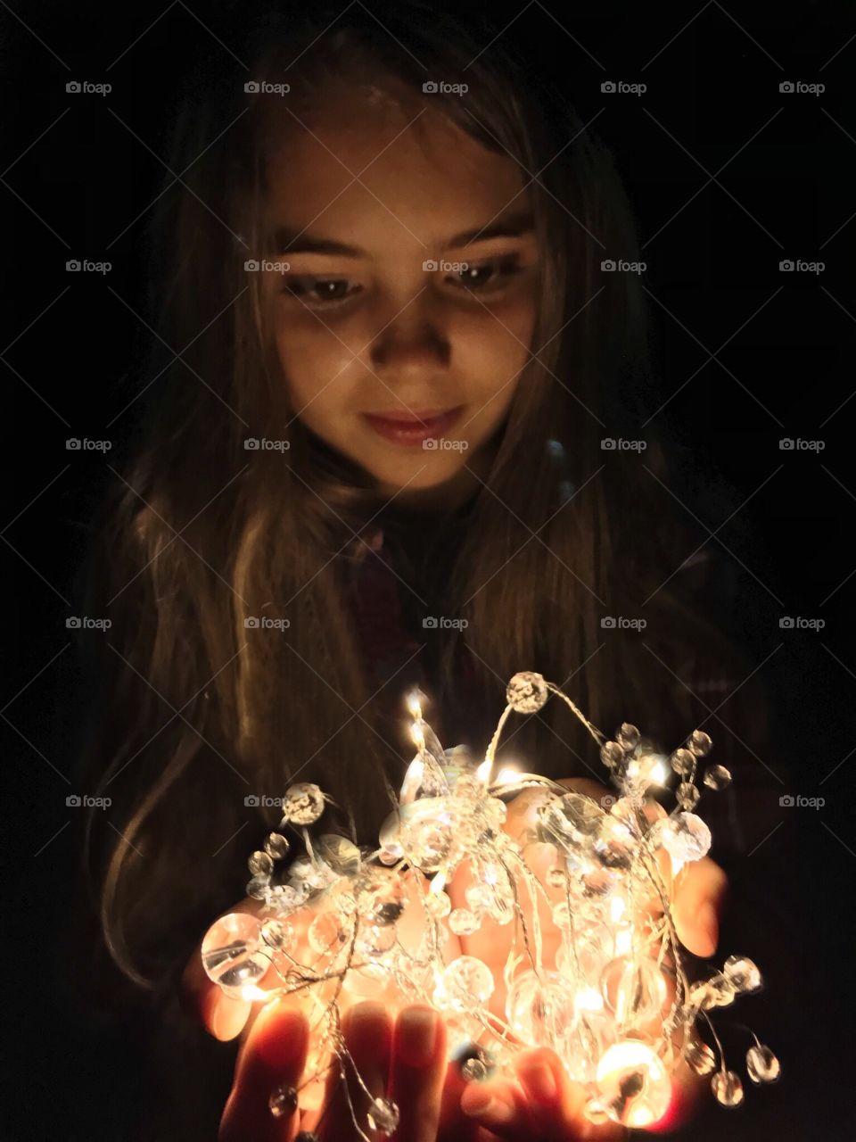 Girl playing with ferry  lights 