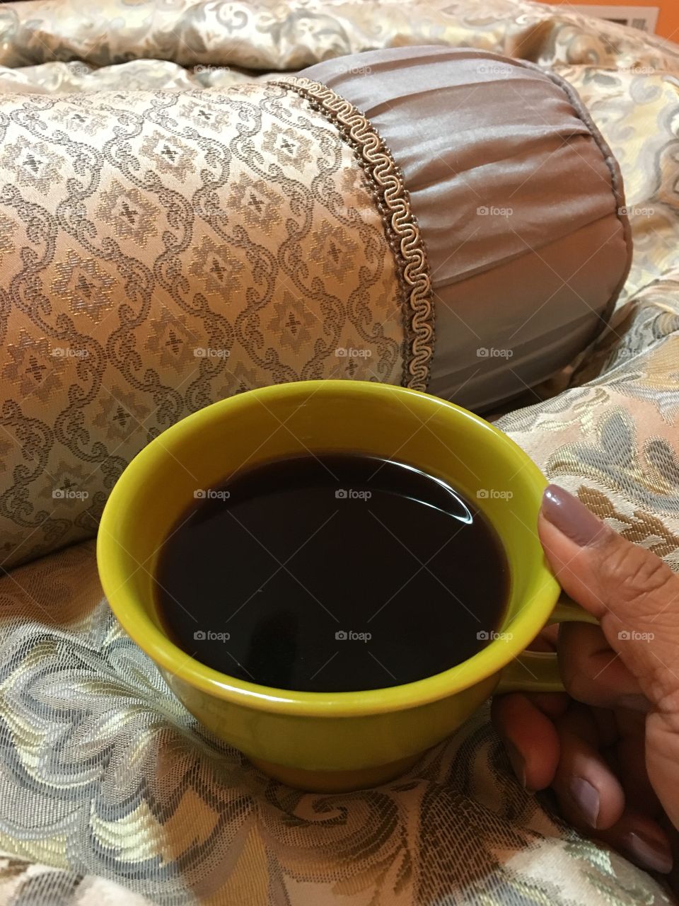 Morning cup of happiness in bed