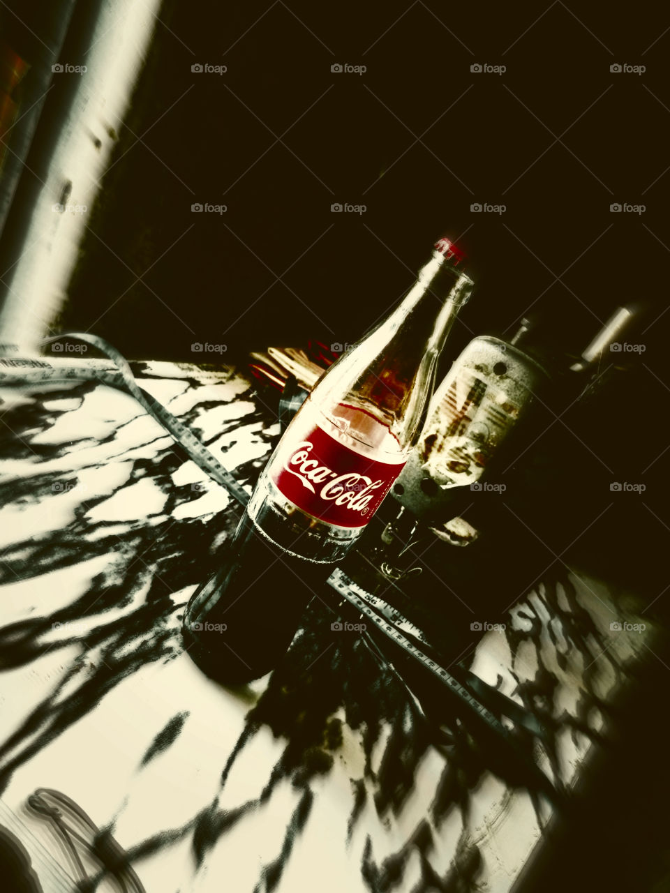 chilling with a chill coca cola bottle drink after work