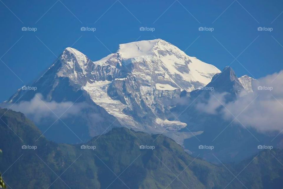 The view of Dhaulagiri 1 that we had as we reached the top of a hill. The mountain was still about a 9 days walk from that location. Taken on the Dhaulagiri Circuit Trek in Nepal.