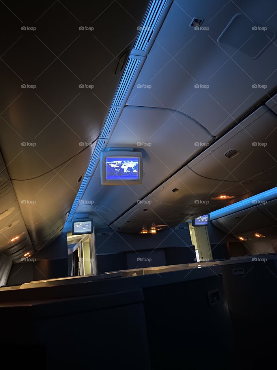 Inside the Business Class section of a American Airlines Boeing 777 flying from Los Angeles California to Miami Florida 