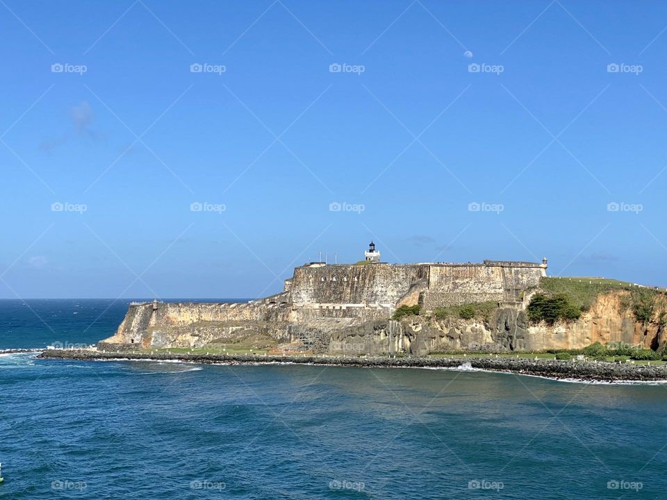 A fort at the entrance to a harbor