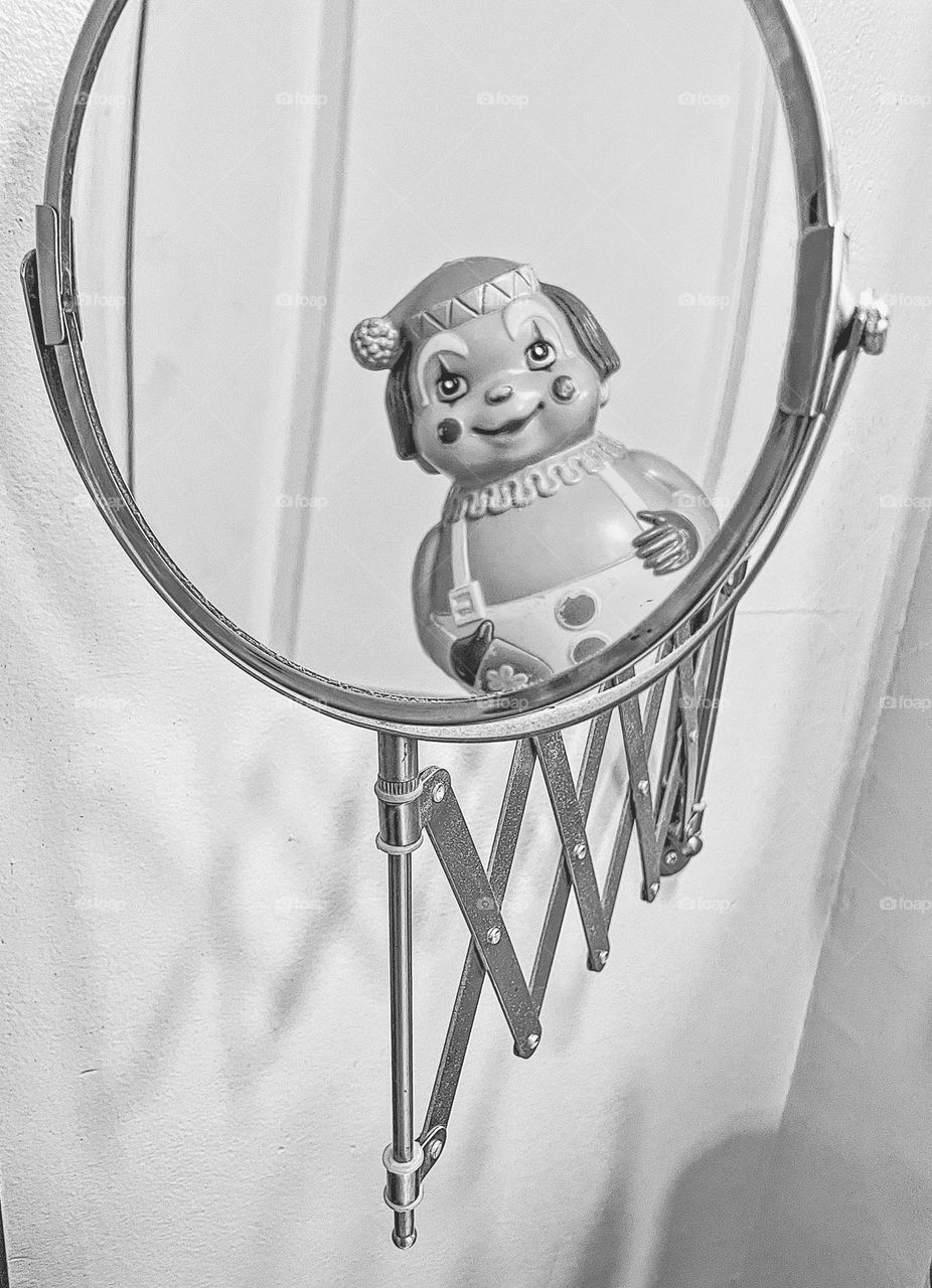 Creepy clown in the mirror, spooky black and white Halloween image, clowns in mirrors, spooky clowns, scary clowns in monochrome, clowns can be scary, afraid of clowns 