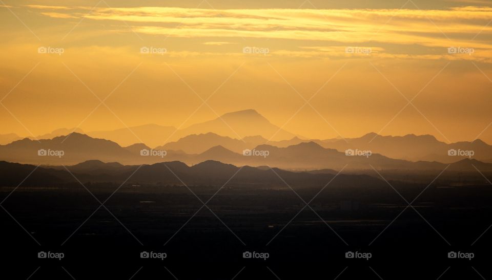 Sunset over the White Tank mountains, view from summit of Piestewa Peak, Phoenix, Arizona