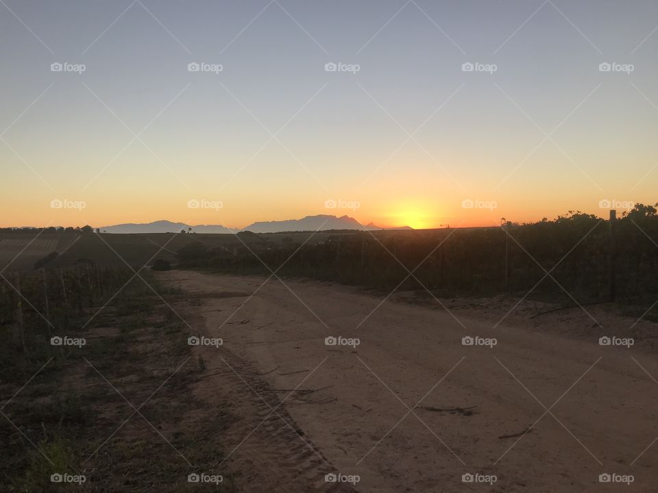 Sunrises, sunsets and the moon! Sleeping Giant with the sun setting behind it. Managed to capture this beauty while cycling in Stellenbosch, Cape Town