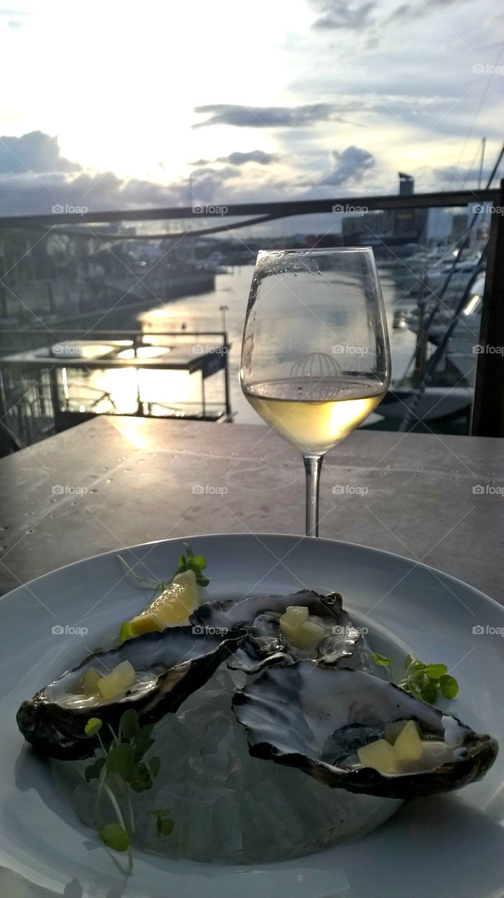 White Wine and Oysters at Sunset. Auckland, NZ. February 2015.