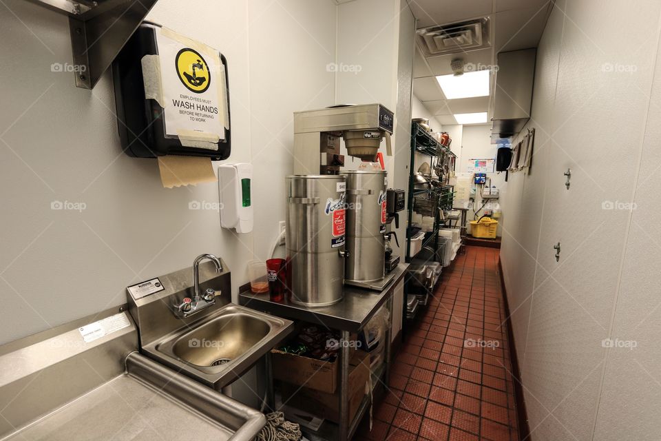 Kitchen storage cleaning inside the restaurant 