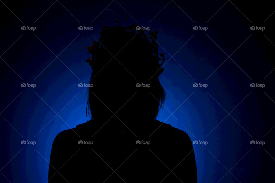 Blue silhouette of girl