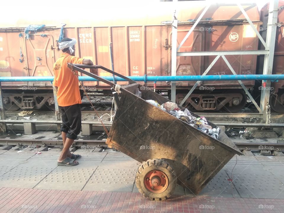 Dustbin vehicle at railway platform...