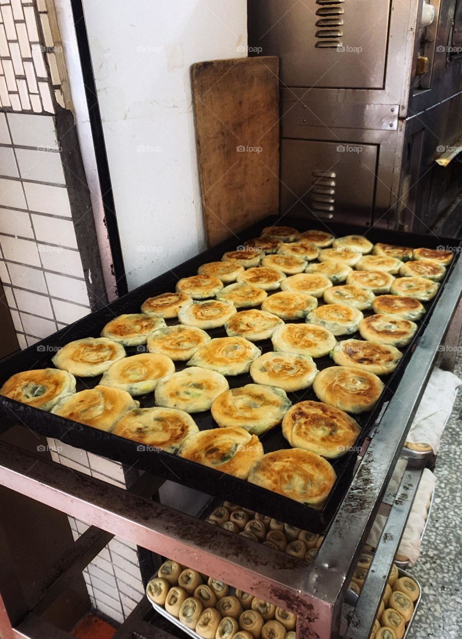 Baked pastry next to oven