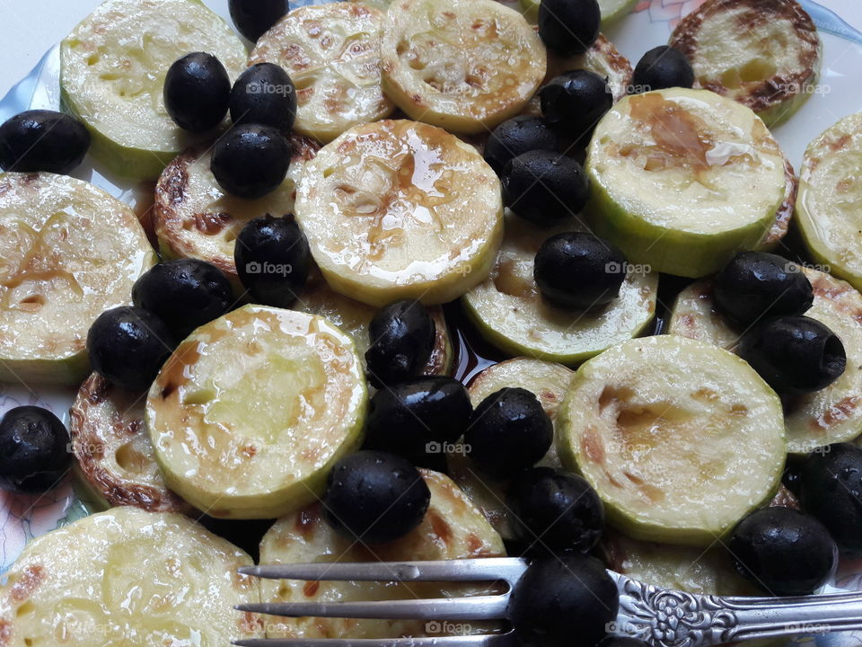 Elevated view salad with fork