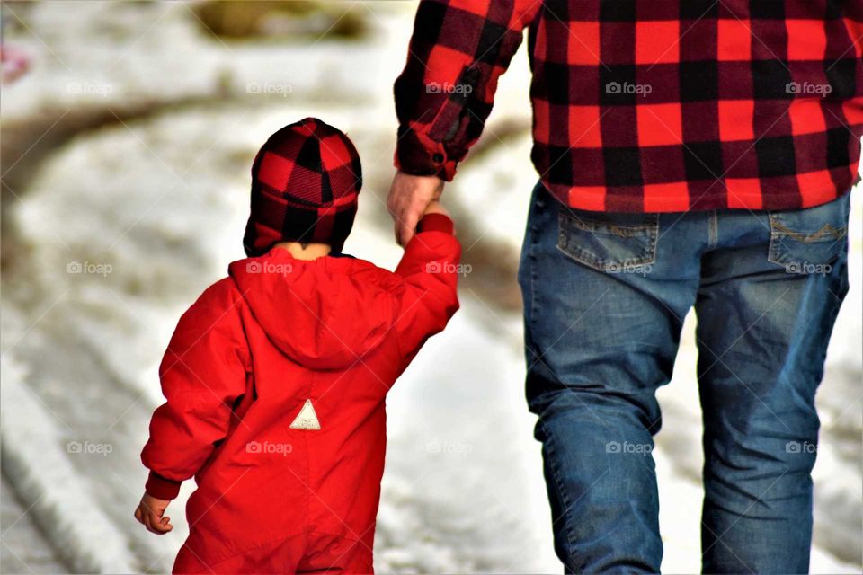 father and son walking