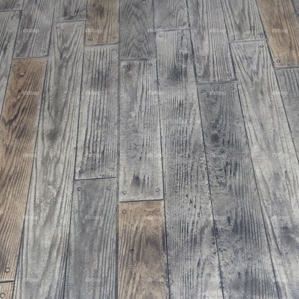 Stamped concrete wooden floor. Beautifully finished shop floor. 