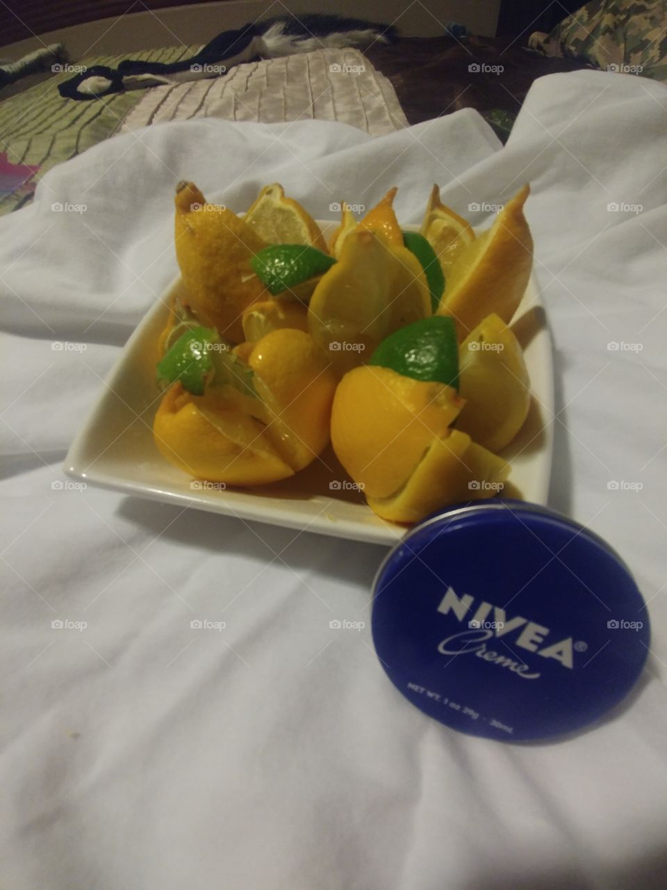Beautiful way to start the day with fresh lemonsalong with fresh Limes and Nivea Cream to help with dry skin.