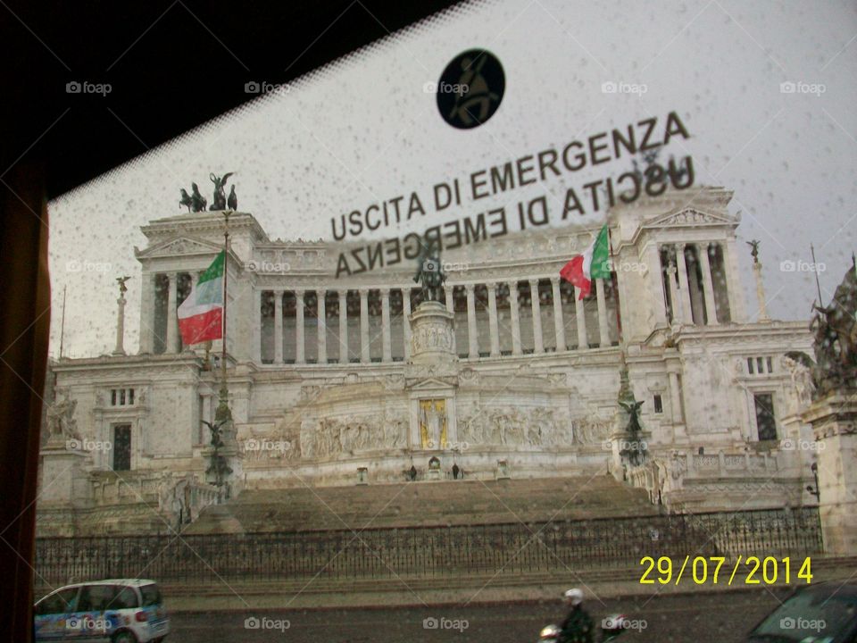 Roman architecture from the tour bus window in the rain