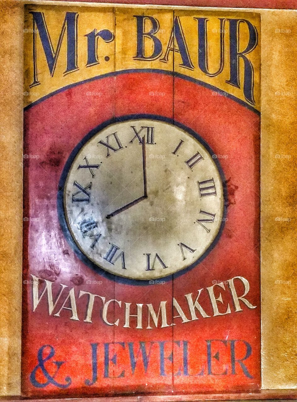 clock sign. thought this sign in a restaurant
