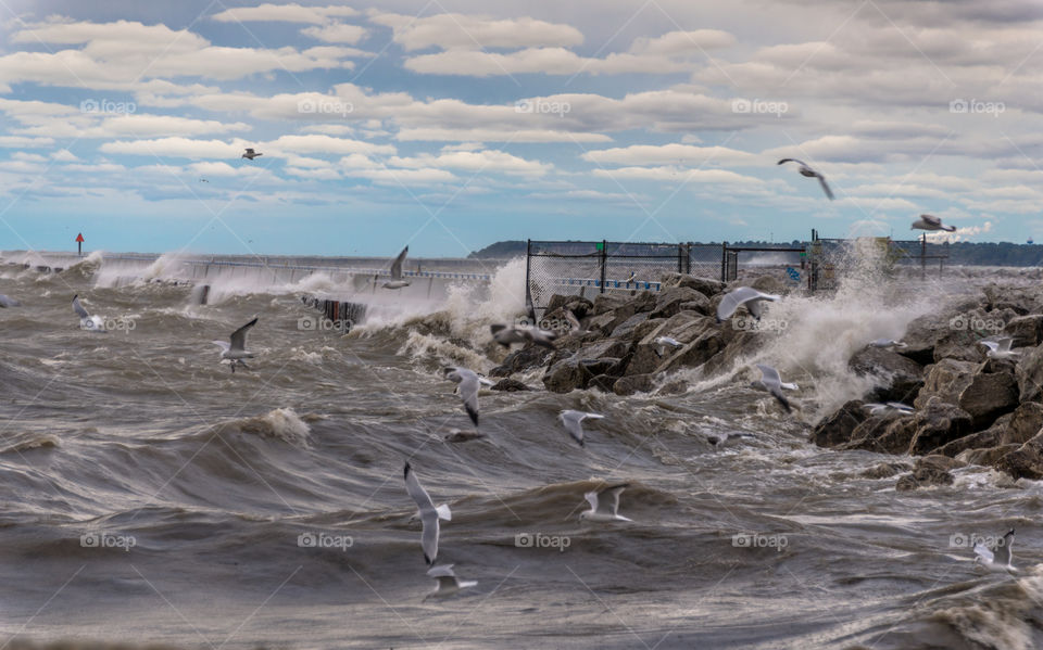 Crashing waves on Lake. Crashing waves hitting shoreline on Lake Michigan in Milwaukee Wisconsin