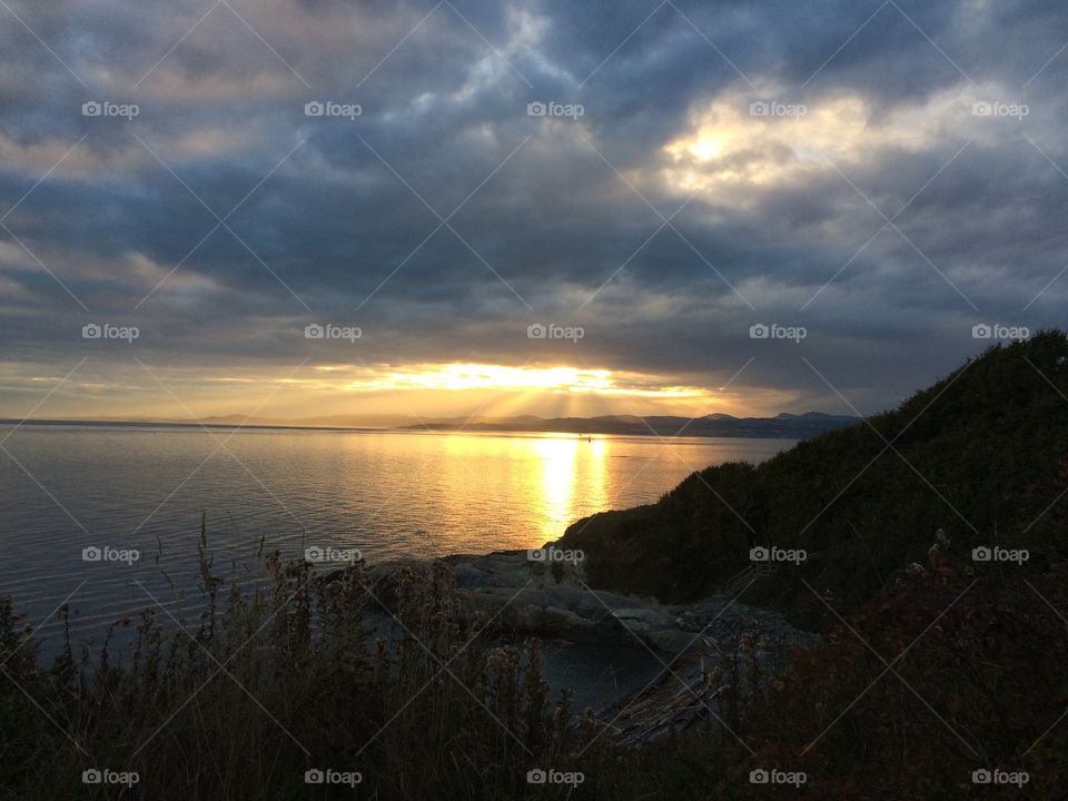 Scenic view of sea and cliff