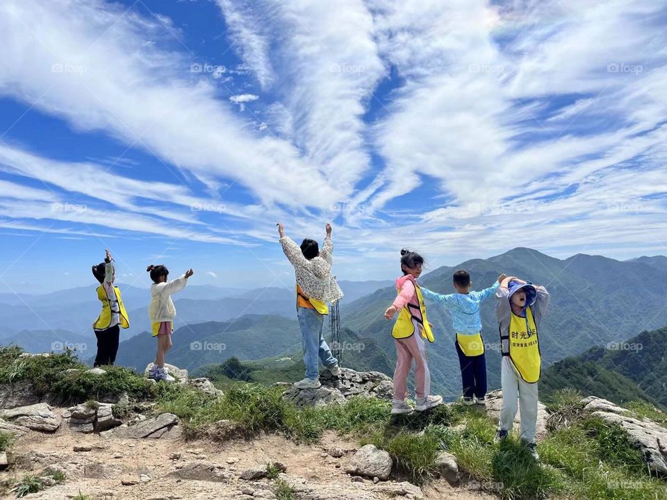 Youthful fun on the top of mountain 