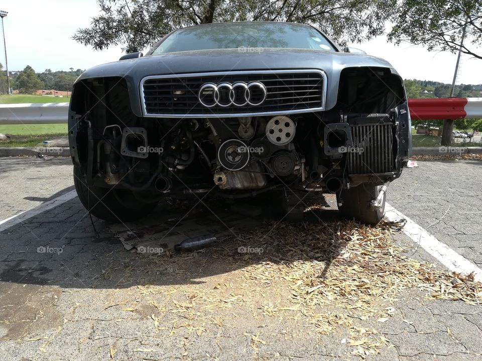 Wrecked Audi front and the stories it tells