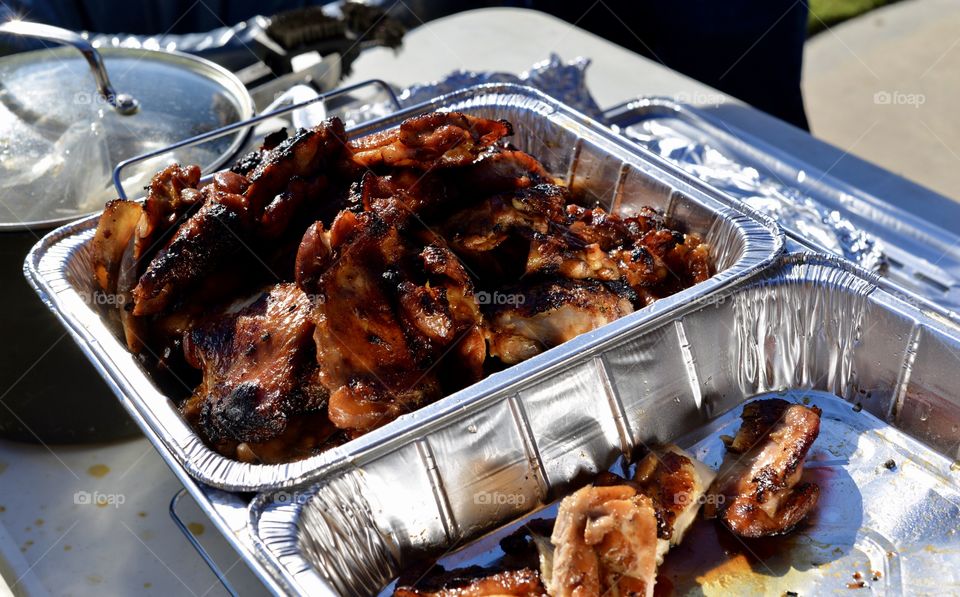 Hawaiian BBQ chicken hot on the grill