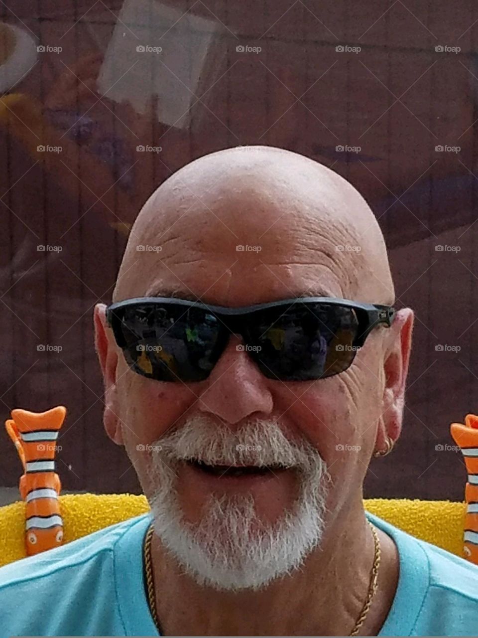 Facial hair is the best accessory - A bearded man's face! Bald headed! He designs his beard from time to time but this is my favorite look!