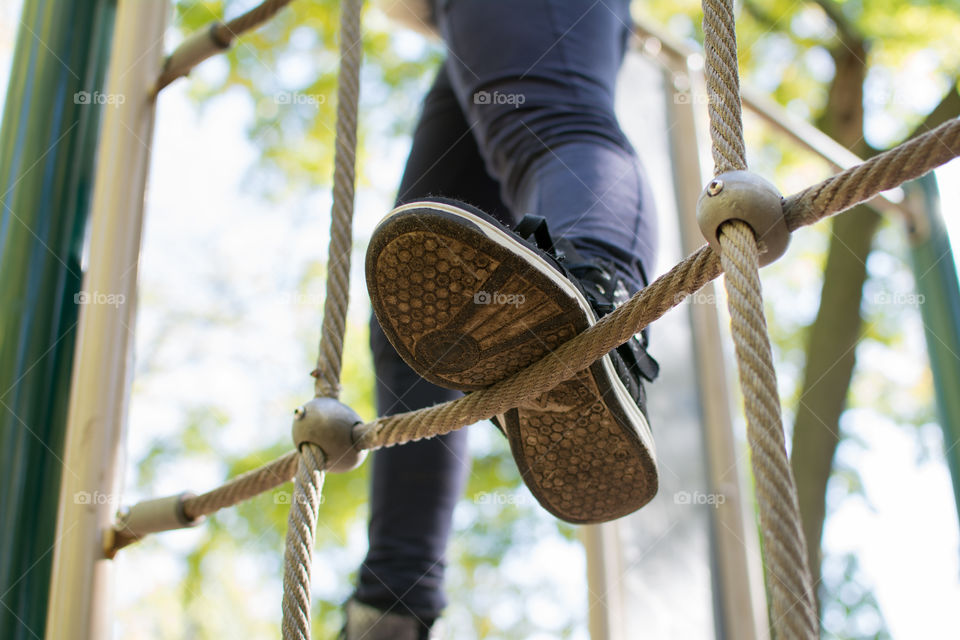 Child foot on the playground