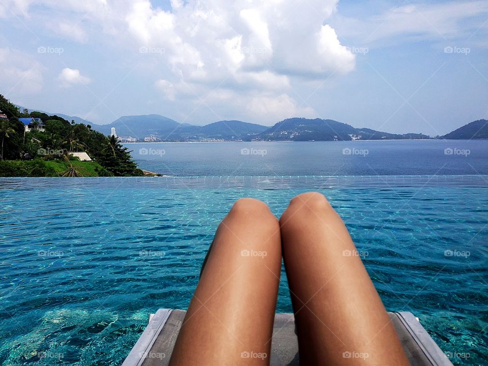 Relaxing at swimming pool 