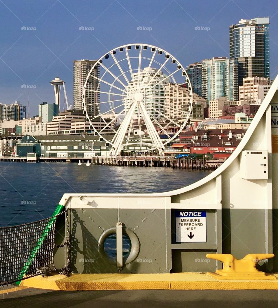 Seattle Great Wheel & Space Needle from the deck of Washington State Ferry