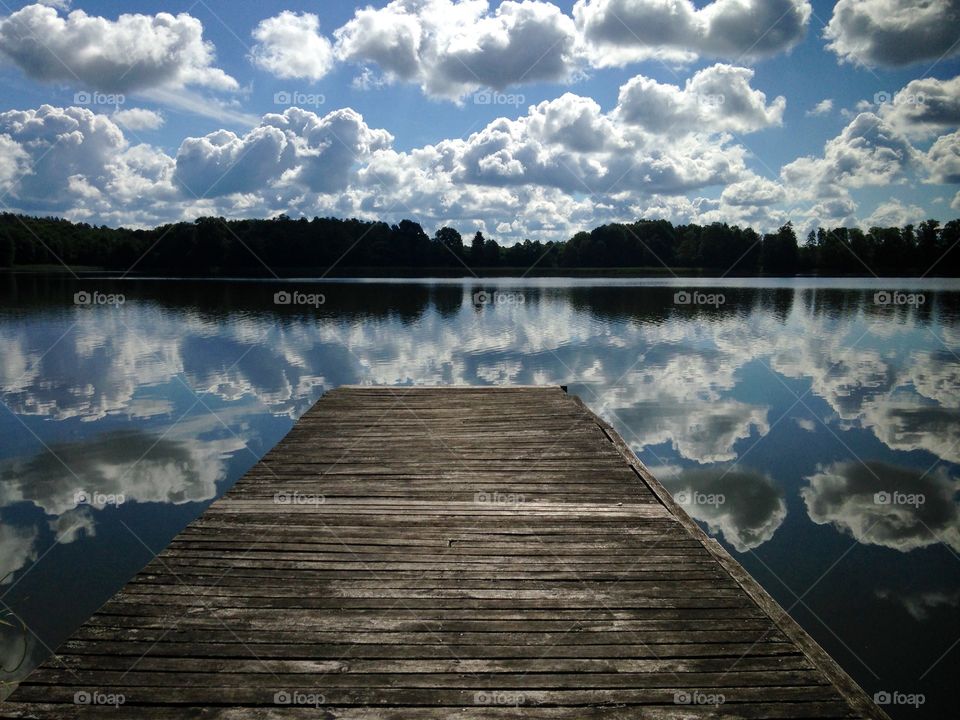 Cloud reflecting on lake in Poland