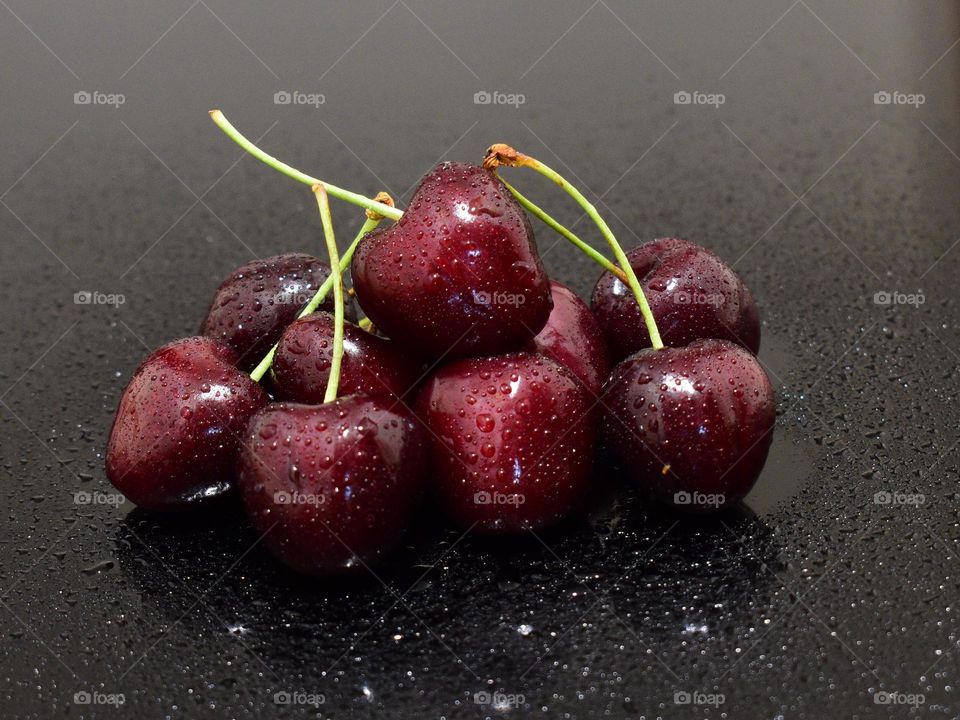 fresh cherries on a black background