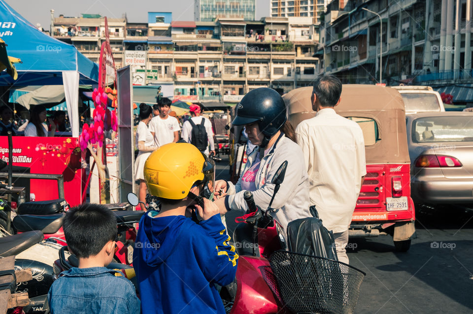 Children wearing helmet for safety