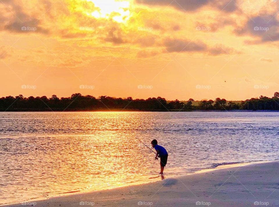 Fishing at sunset