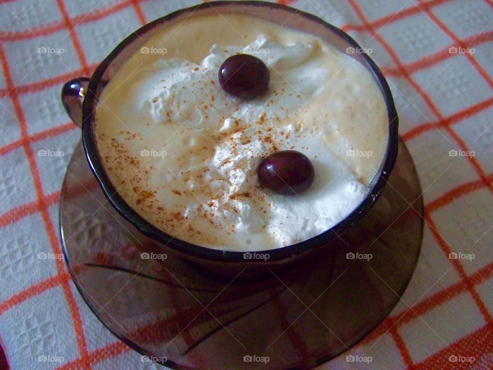 Coffee topped with whipped cream