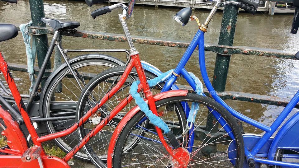 Red bike. Blue bike. Locked together ❤️