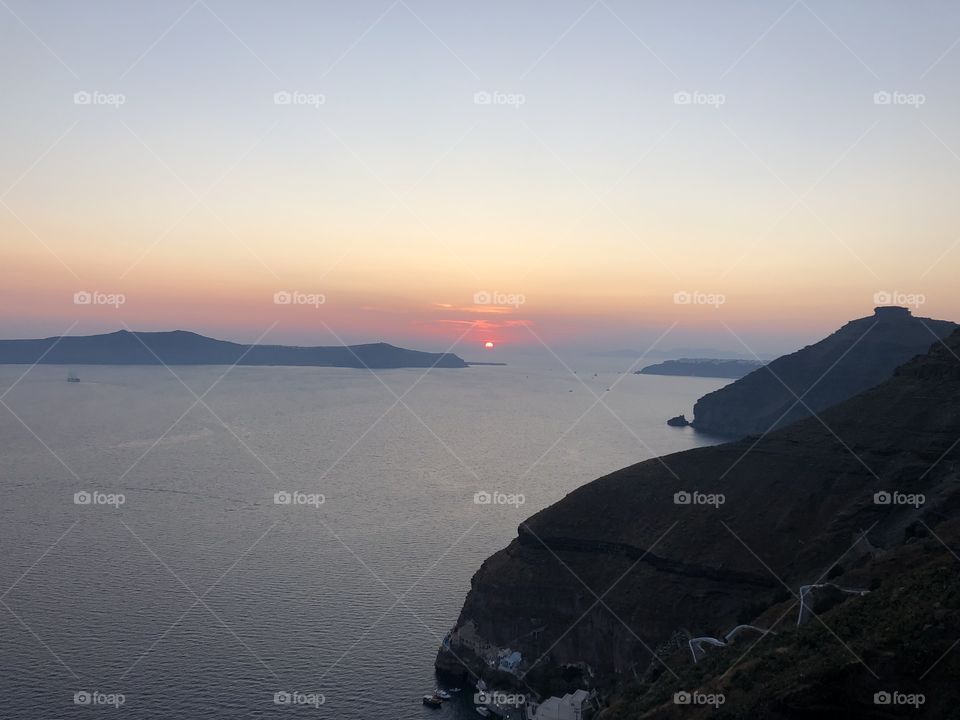 Grasping the last daylight in Santorini, Greece