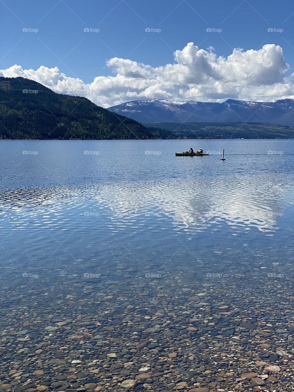 Sky reflects on the lake’s water 