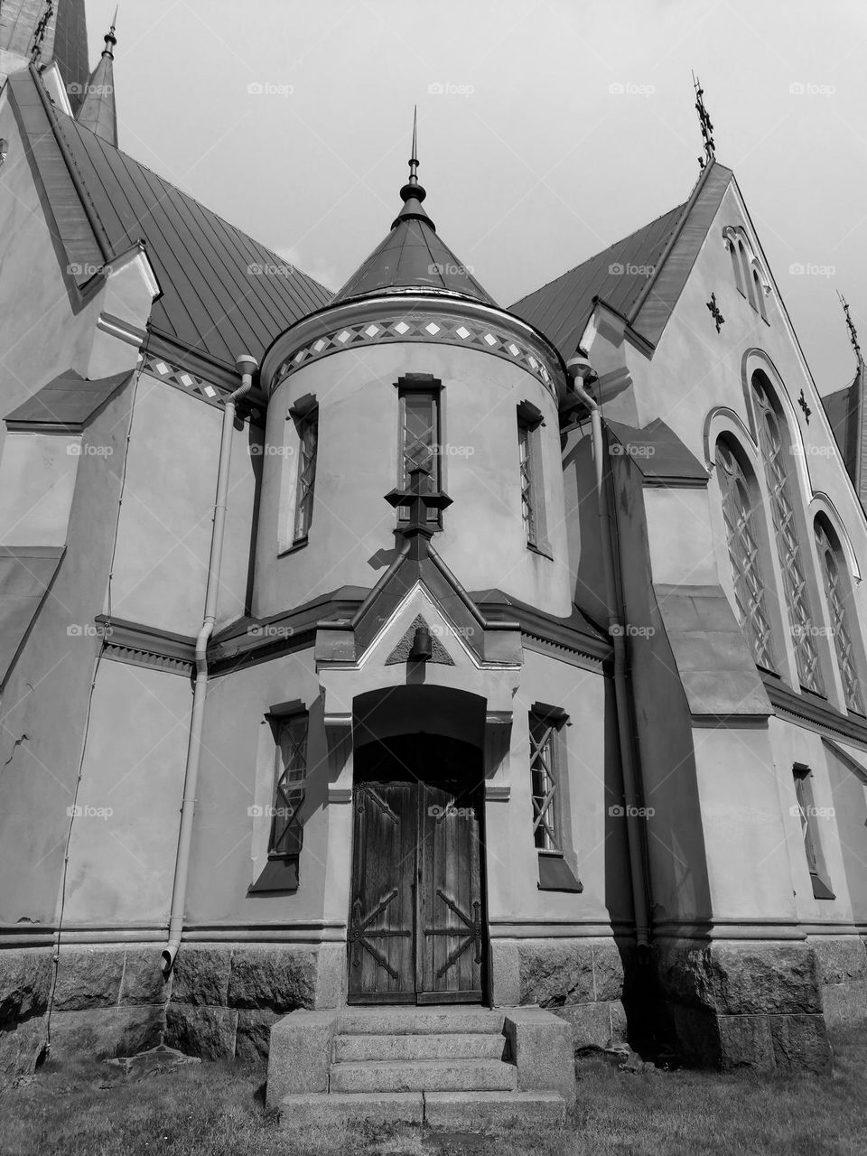 In Lapland, Finland, there is a pink gothic church in Kemi. In black and white, its architectural forms stand out wonderfully
