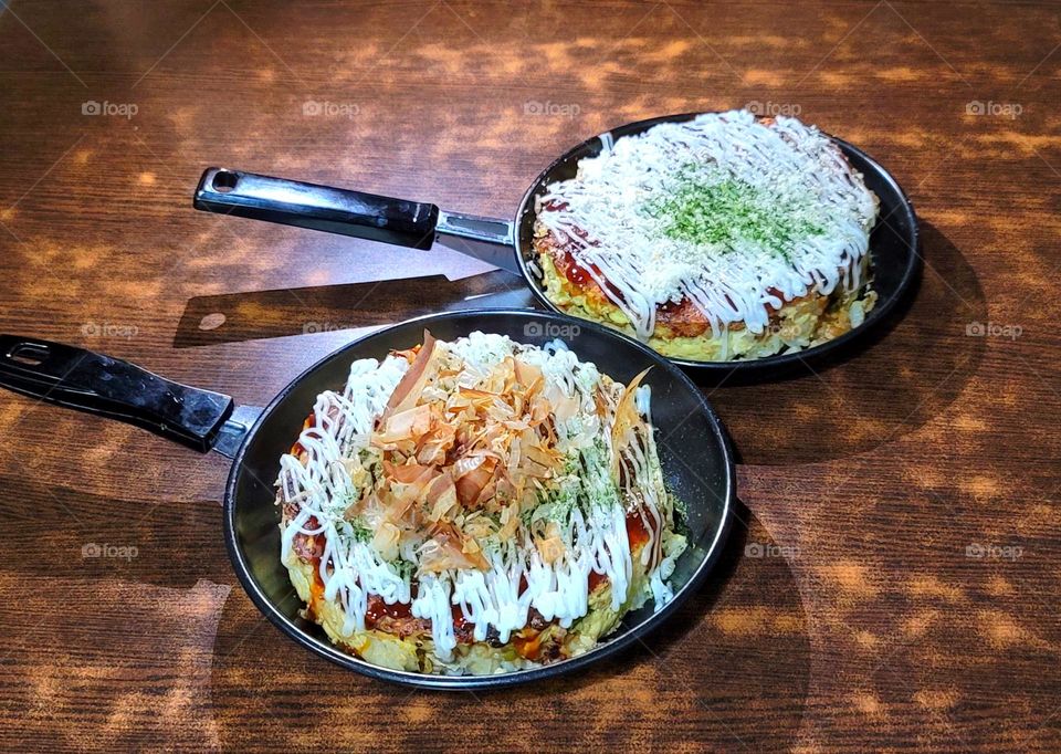 Okonomiyaki with mayonnaise, bonito flakes ,and seaweed powder